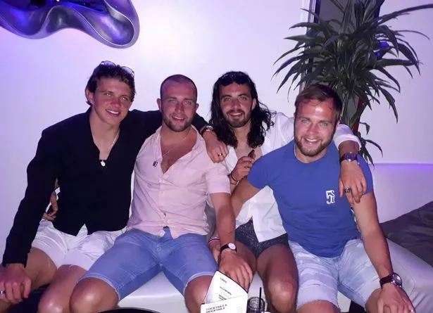 Gallagher with his brothers